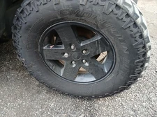 Used Wheel fits: 2012 Jeep Wrangler 17x7-1/2 5 spoke painted black Grade A