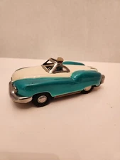 Vintage tin friction toy car by Alps, Japan