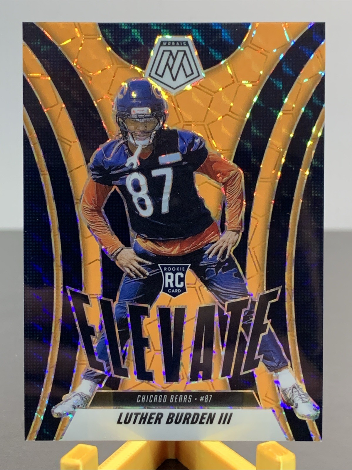 2025 Panini Mosaic Elevate Luther Burden #7 Orange Fluorescent Mosaic Prizm (RC)