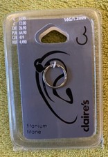 Fabrycznie nowy z metką TYTANOWY KOLCZYK 'CLAIRE'S' 1,2 mm