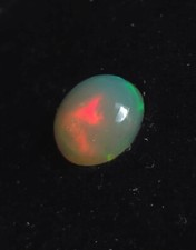 Cabochon (n°18) rond d’Opale Welo blanche d’Ethiopie de 1,01 cts