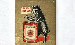 GOWRIE, IOWA 1930'S- E. J. BRUNTLETT, PIG EATING SARGENT FEED