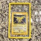 Pokémon TCG Zapdos Holo 1999 WOTC Base Set 16/102 Vintage TAG 8 NM MT