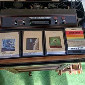 ATARI 2600 WOODGRAIN 6S CONSOLE W/CONTROLLERS,GAMES,ORGANIZER UNTESTED PARTS 