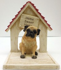 PUG, SMALL SITTING IN FRONT OF DOGHOUSE "HOME SWEET HOME"