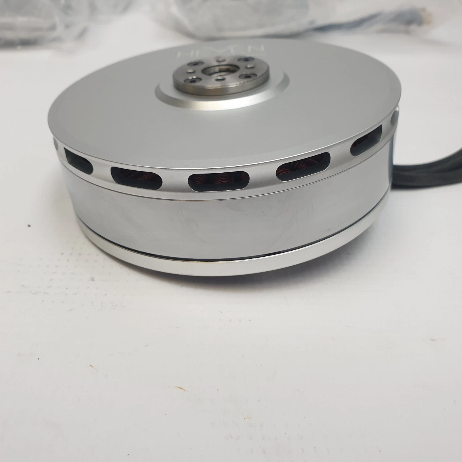 Side view of the P150 KV120 motor showing the vented silver housing