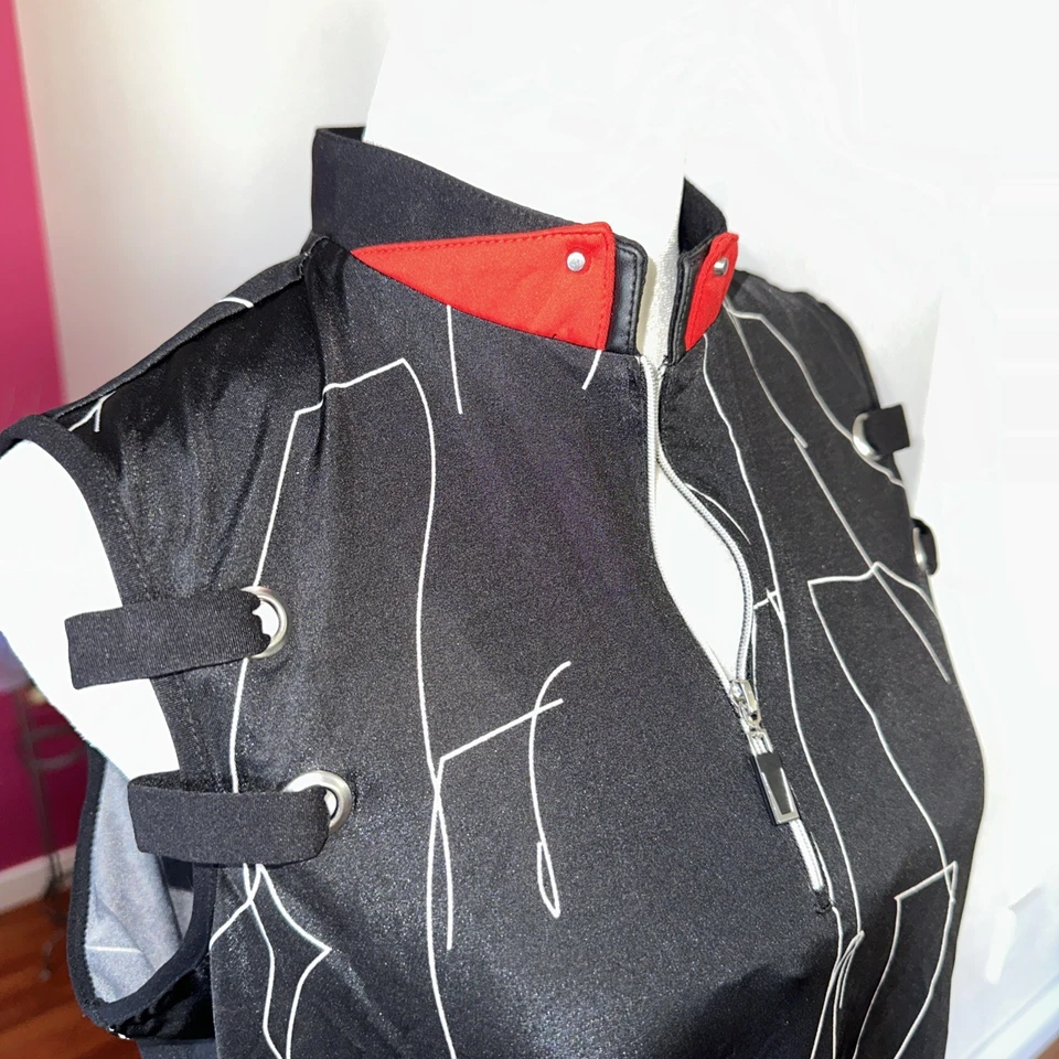 Top sin mangas de golf Jamie Sadock 1/4 cremallera negro con diseño geográfico blanco cuello rojo Foto 2 de 4