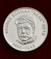 BABE RUTH SILVER COIN, BASEBALL'S FIRST GREAT SLUGGER