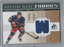 MARIAN GABORIK AUTHENTIC FABRICS GOLD SP 2011-12 GAME USED HOCKEY JERSEY CARD