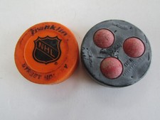 Two vintage used street hockey pucks Franklin Soft & Hotpucks USA pat pending