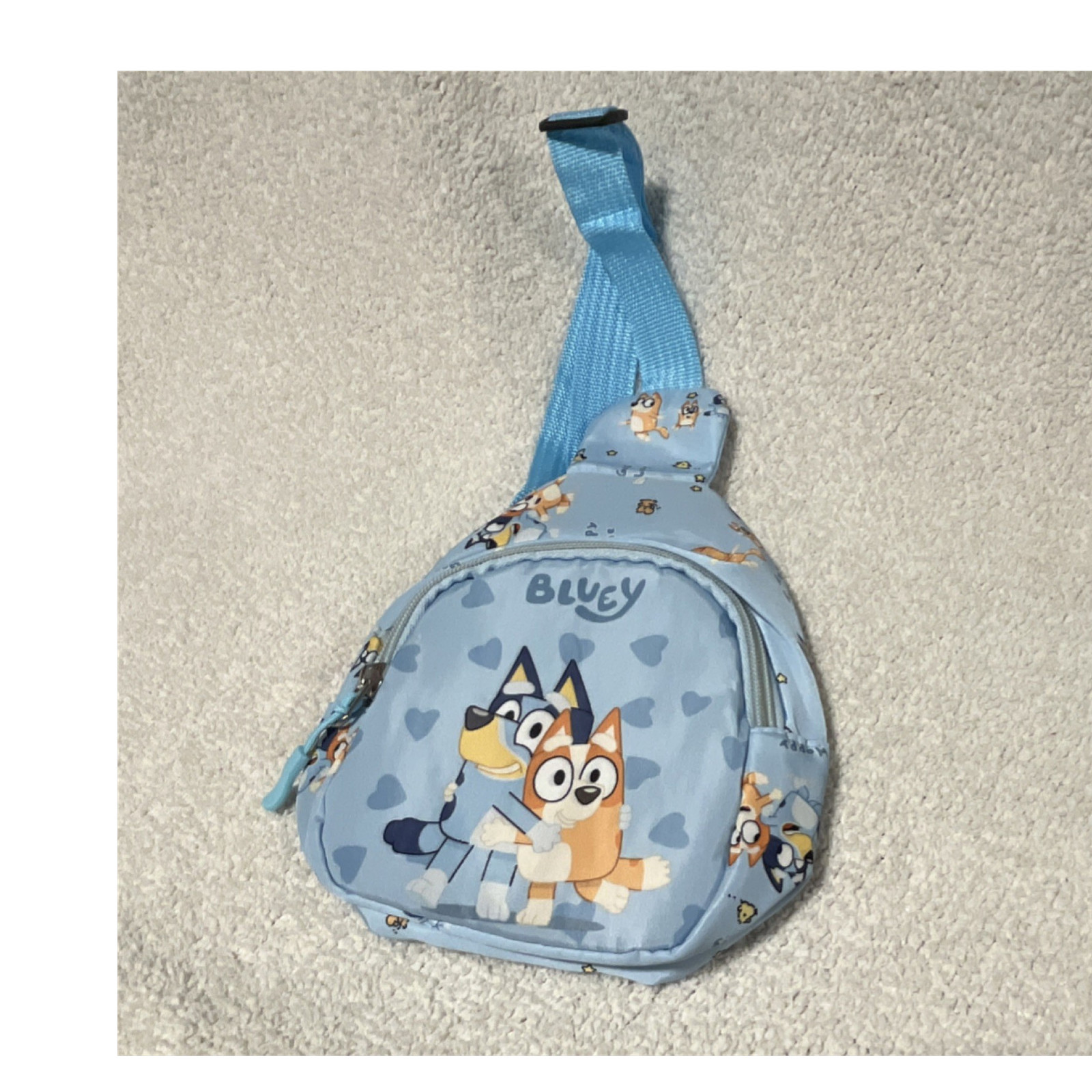 Bluey Kids Small Blue Sling Backpack Hearts Pattern Zip Closure adjustable strap
