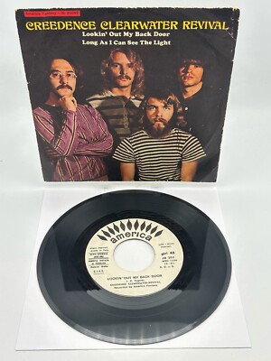 CREEDENCE CLEARWATER REVIVAL - LOOKIN' OUT MY BACK DOOR -(PROMO) (45 RPM - ITALY)