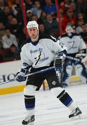Defenseman Cory Sarich Tampa Bay Lightning is on the ice at - Ice Hockey Photo