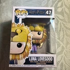 Funko Pop! Harry Potter Luna Lovegood with Lion Head #47 with POP Protector