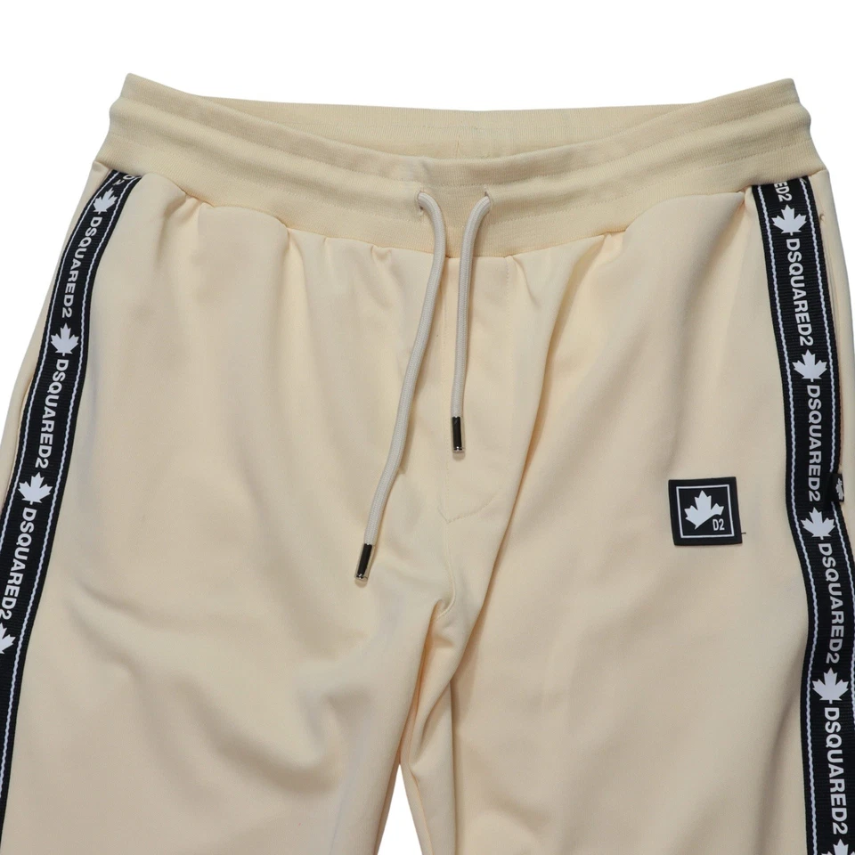 Pantalones deportivos Dsquared2 para hombre talla 2XL cremallera al tobillo crema/amarillo claro Foto 3 de 4