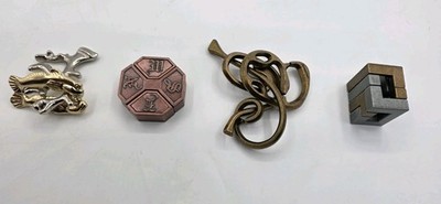 Lot of 4 Hanayama Cast Metal Brain Teaser Puzzles News Reef Enigma Coil 