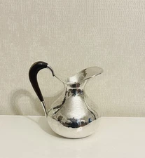 Contemporary Sandra Jordan Sonoma Hand Hammered Pitcher Silverplate