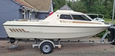 ​Fletcher Vigo 17ft Cabin Cruiser Boat, 60hp Mercury 2-Stroke Engine & Trailer