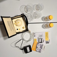 Medala Breast Pump Battery Operated 24mm 27mm Flanges Included 2 Bottles