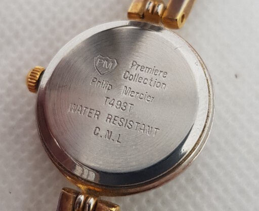A Simple No Fuss Ladies Philip Mercier White Face Watch Gold Tone