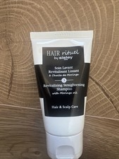 Image of Sisley Hair Rituel Revitalizing Straightening Shampoo  With Moringa Oil 50ml