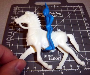 Vintage 4 x 3.5 inch blue Native American on white horse, plastic Ajax