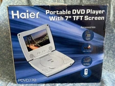 Haier Portable DVD Player w/ 7” TFT LCD Monitor & Remote. Brand new
