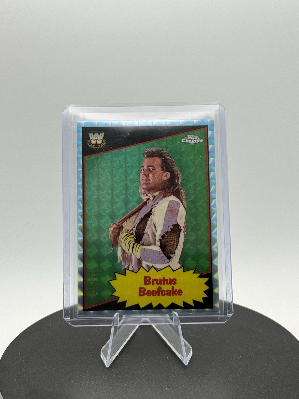 2025 Topps Chrome WWE Brutus Beefcake 1985 Aqua Geometric Refractor /125