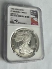 1986-S American Silver Eagle NGC PF-69 ULTRA CAMEO Mercanti Signed