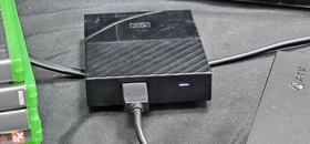 Microsoft Xbox One X with 1 controller, 4TB External Hard Drive, & 9 Games