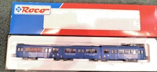 ROCO HO 43190 ELECTRIC 8 AXLE DBL ARTICULATED STREET CAR "NIGHT & DAY" NIB