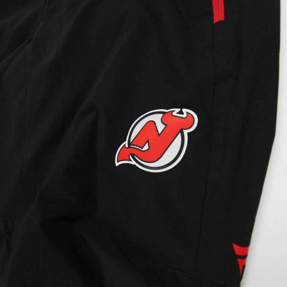 Pantalones deportivos New Jersey Devils Fanatics para hombre negros usados Foto 2 de 4