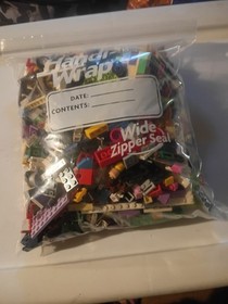 Gallon Sized Zip Lock Full Of Legos Bricks And Figureines