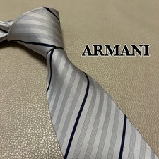 Giorgio Armani tie, striped and dotted pattern, silver and light gray color.