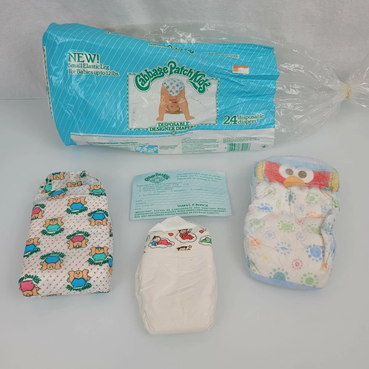 Lot 7 Vintage Plastic Baby Diapers 90s Cabbage Patch Kids Pampers Elmo
