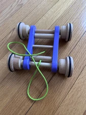 Wooden Pull Along Toddler Walking toy Purple Wagon Green Toys