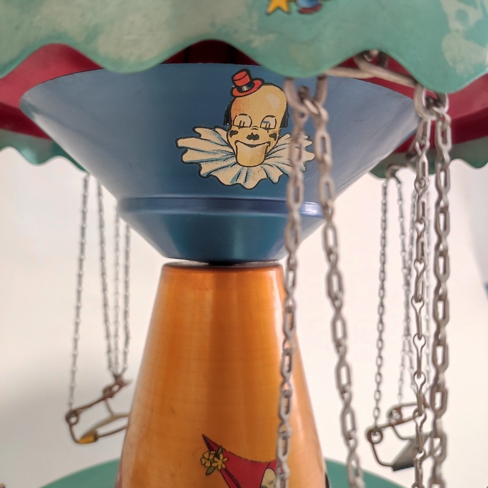 Giocattolo in latta giostra bambini seggiolini volanti 22x34 cm foto 6