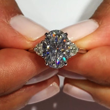 3.45Ctw Oval Cut Moissanite Three-Stone Engagement Ring In 14K White Gold Plated