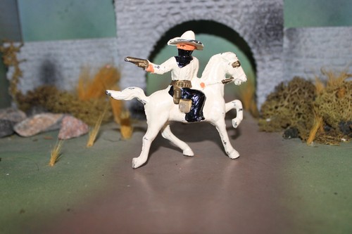 NEAR MINT BARCLAY LEAD TOY MASKED COWBOY ON HORSE SHOOTING PISTOL MARKED "99"