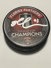 Brad Marchand Signed Puck 2025 Panthers Stanley Cup Beckett BAS COA IP Auto c