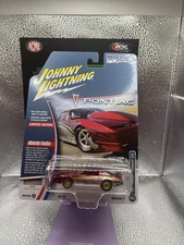 JOHNNY LIGHTNING 1987 Pontiac Firebird King of the Jungle 1:64 JLMC034 A