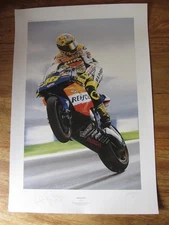 Signed Valentino Rossi 745x500mm print. Sue Worthy 328/500. 