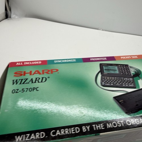Sharp Wizard OZ-570PC WITH DOCK Pocket Organizers Personal PDA Data Pocket 256KB - Photo 5 sur 17