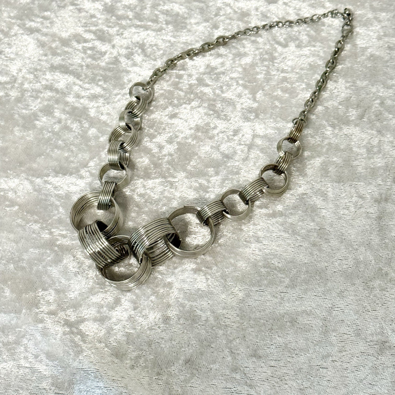 Unique Silver-Toned Interlocking Spirals Coil  Li… - image 4