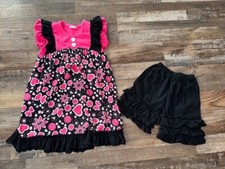 Girls boutique 2 piece outfit. Size 8 3XL Tunic shirt Ruffle shorts. Worn once.