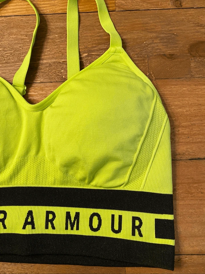 Sujetador deportivo Under Armour pequeño verde neón negro compresión media Foto 2 de 4