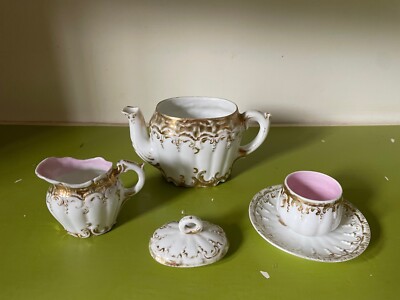 Vintage Tea Pot Set with Tea Pot, Creamer, Saucer, Broken cup, Etc,