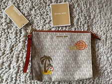 Michael Kors Jet Set Go White Zippered Clutch New with tag never used white