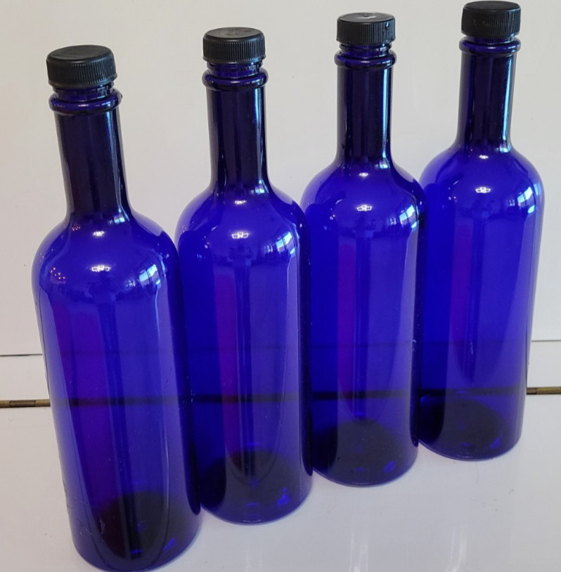 4 COBALT BLUE PLASTIC BOTTLES WITH BLACK PLASTIC LIDS 11 INCHES HOLDS 28 OZS