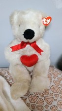 ty beanie buddy's collection Romeo the Bear, highly sought after P. V. C pellets